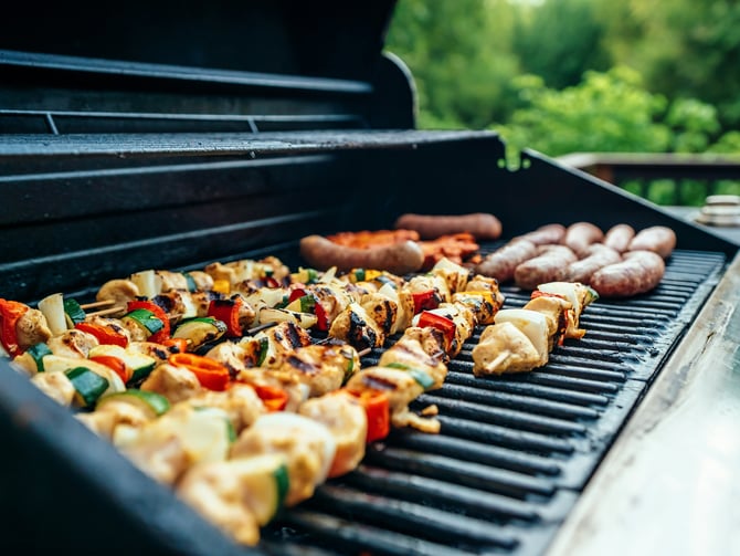 Colorful kebabs on a gas grill